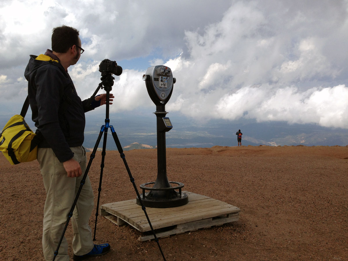 Jonathan steadies the camera at the summit of Pikes Peak. Or possibly interviews an alien robot. It's hard to tell.